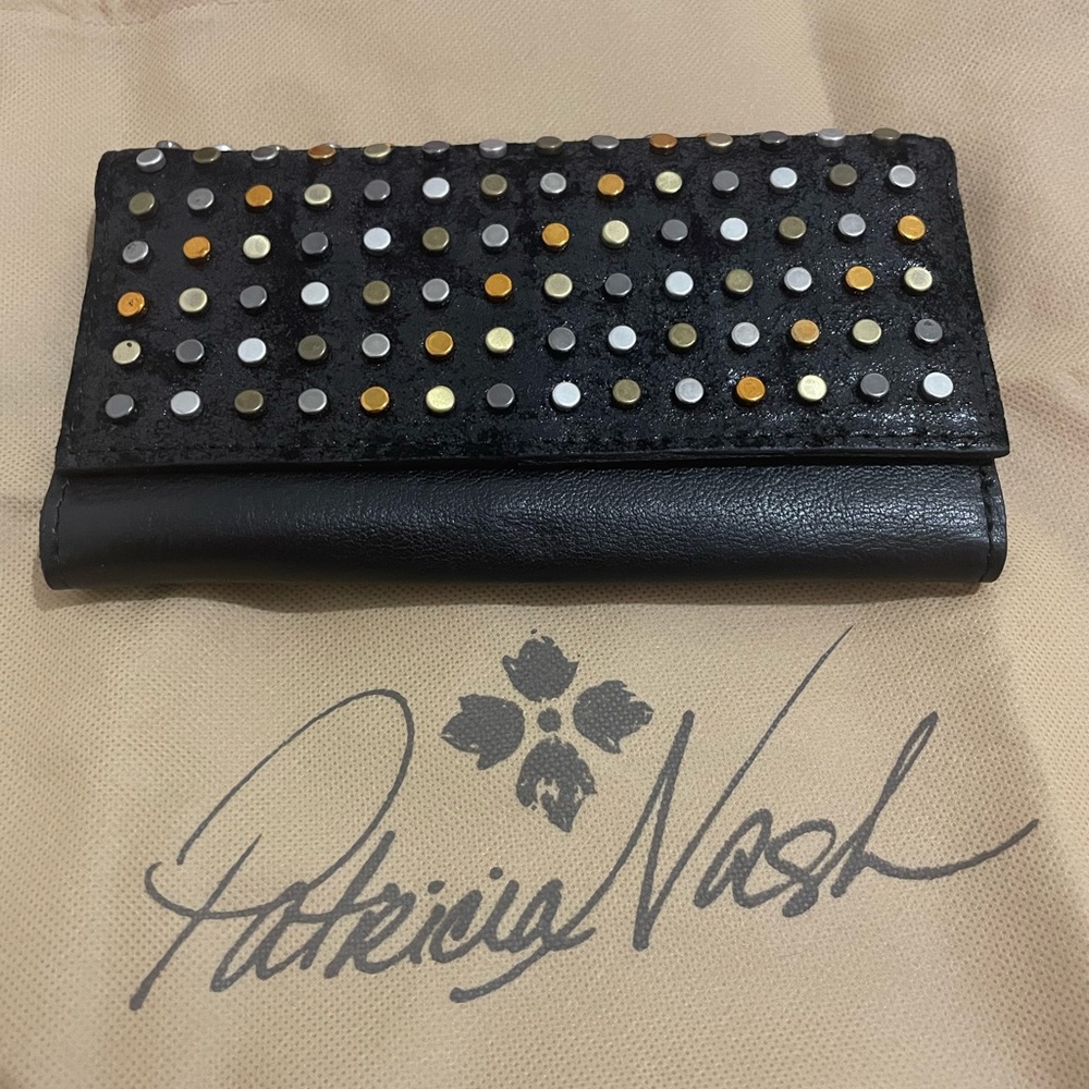Patricia Nash beautiful black leather wallet with 4 different metal stud colors